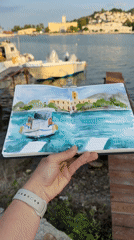 Artist sketches watercolor harbor scenes in Poros, Greece