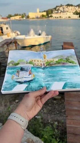 Artist sketches watercolor harbor scenes in Poros, Greece