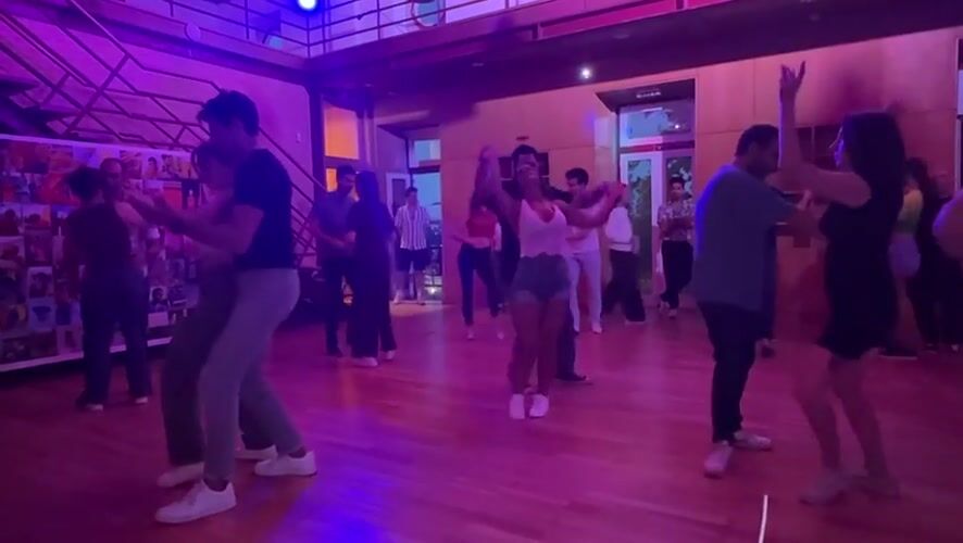 Salsa dancing session observed in Almada studio Friday evening