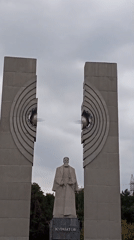 Chelyabinsk park with camel sculptures, flowers, and public art