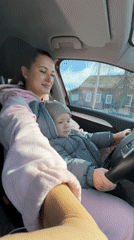 Woman documents morning moments with child in rural setting