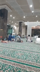 Friday prayers and a street stall in Randuagung, Indonesia