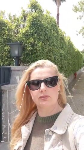 Lisbon street moments: selfie, pomegranate bloom, azulejo tiles