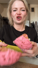 Woman celebrates Easter with traditional kulich bread in Saint Petersburg
