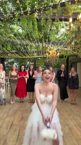 Bouquet toss moment at an outdoor Tbilisi wedding