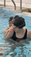 Children participate in swimming lessons and play in Birobidzhan pool