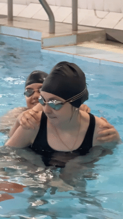 Children participate in swimming lessons and play in Birobidzhan pool