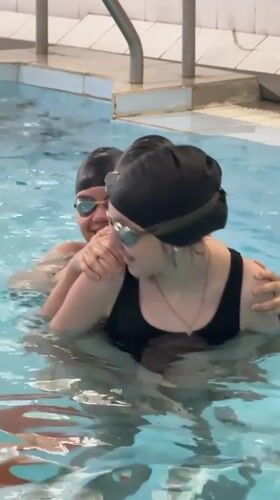 Children participate in swimming lessons and play in Birobidzhan pool