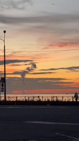 Sunset stroll along a Saint Petersburg waterfront promenade