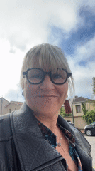 Woman in leather jacket spotted smiling in Montrond-les-Bains