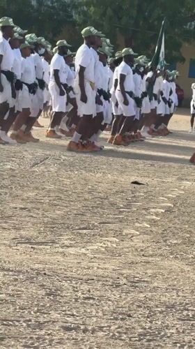Uniformed men march in formation in Maiduguri, Nigeria