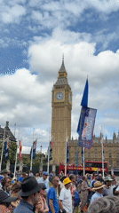 Pro-EU crowd rallies outside Parliament with flags and capes