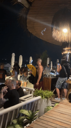 Evening social gathering at beachside restaurant in Đà Nẵng