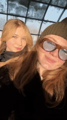 Woman in green beanie documented across snowy Kazan locations