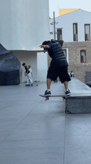 Skaters session Barcelona's plazas on a June evening