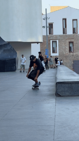 Skaters session Barcelona's plazas on a June evening