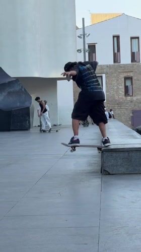 Skaters session Barcelona's plazas on a June evening
