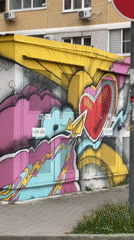 Witness documents colorful street art, traffic in Krasnodar