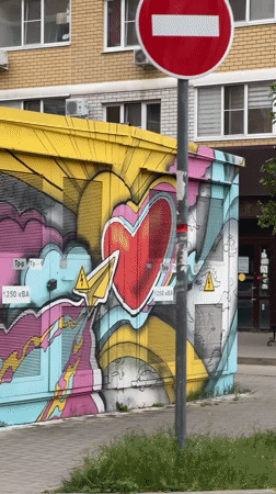 Witness documents colorful street art, traffic in Krasnodar