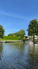 Morning boat journey documented through Leerdam waterways