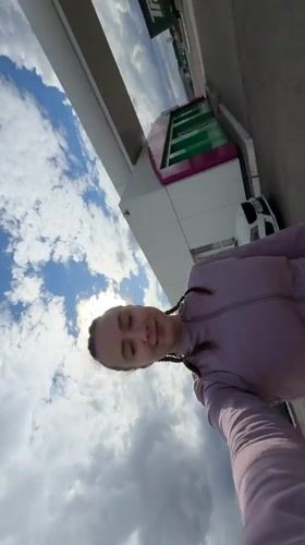 Woman films selfie videos at Russian gas station