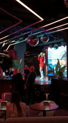 Woman performs live music at Moscow club