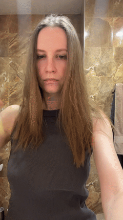 Woman takes selfie, gymnasium activity observed in Khimki