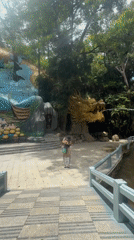Da Lat waterfall with golden dragon sculpture, multiple angles