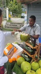 Coconut stop, then crossing the Thai-Malaysian border at Wang Kelian