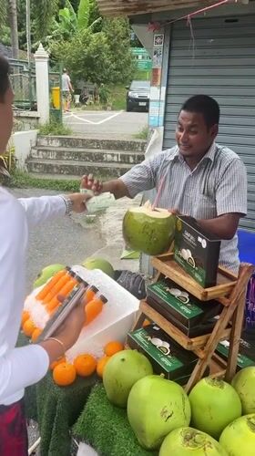 Coconut stop, then crossing the Thai-Malaysian border at Wang Kelian