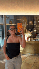 Woman takes selfie at Krasnoyarsk restaurant