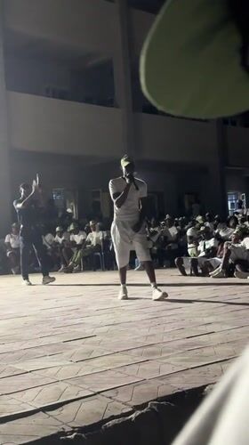 Nighttime musical performance draws audience in Maiduguri courtyard