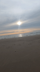 Cloudy beach day documented at Katwijk, Netherlands