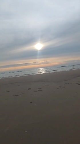Cloudy beach day documented at Katwijk, Netherlands