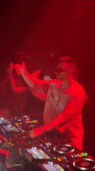 DJ set under red lights at a North Kuta club