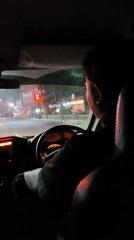 Nighttime road drive through villages in Central Java