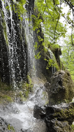 Waterfall and monastery documented in Ribaritsa, Bulgaria countryside