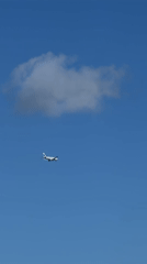 Aircraft spotted over Montenegro's mountainous coast during clear morning
