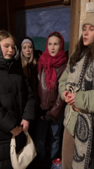 Four women gather in hallway in Yekaterinburg