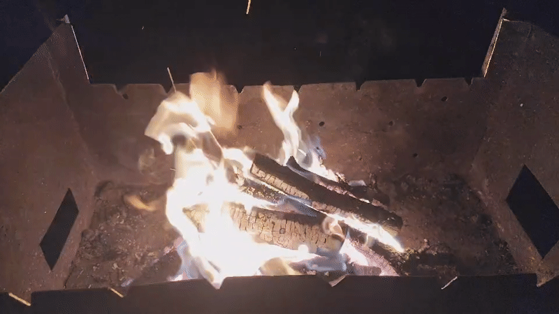 Evening fire and shashlik at a summer gathering in rural Russia
