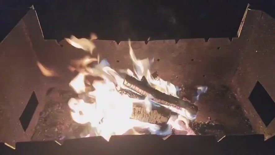 Evening fire and shashlik at a summer gathering in rural Russia