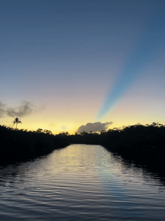 Sunset river scene captured by witnesses in Kadewatta, Sri Lanka