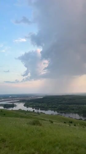Ruined archway and Volga River views at golden hour