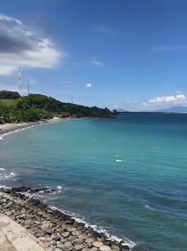 Tropical beach scene documented in Batulayar Barat, Indonesia