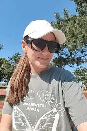 Sunny afternoon park activities documented in Chornomorsk, Ukraine