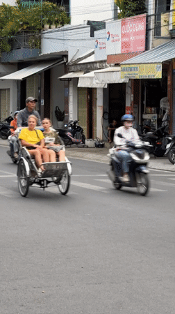Nha Trang intersection buzzing with morning traffic and street life