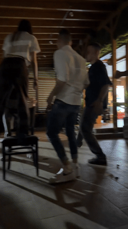 Evening social gathering with dancing captured in Velingrad, Bulgaria