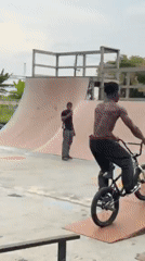 BMX rider performs aerial tricks at Lagos skate park