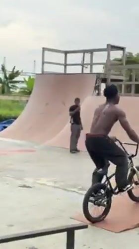 BMX rider performs aerial tricks at Lagos skate park