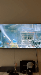 Television displays disaster scene in Eyüpsultan interior space